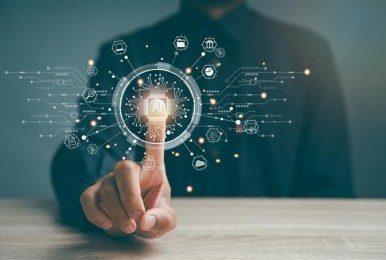 Human reaching towards a screen to interact with AI
