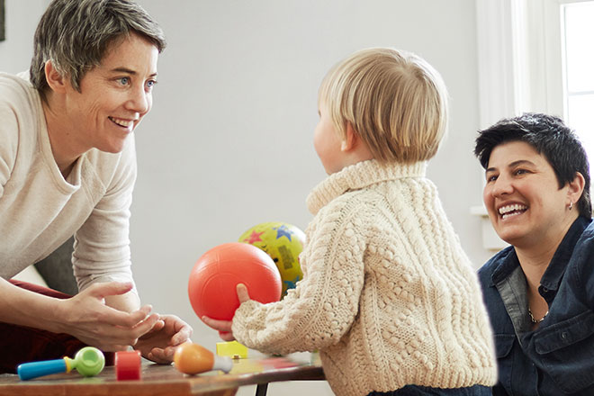 Family playing with child