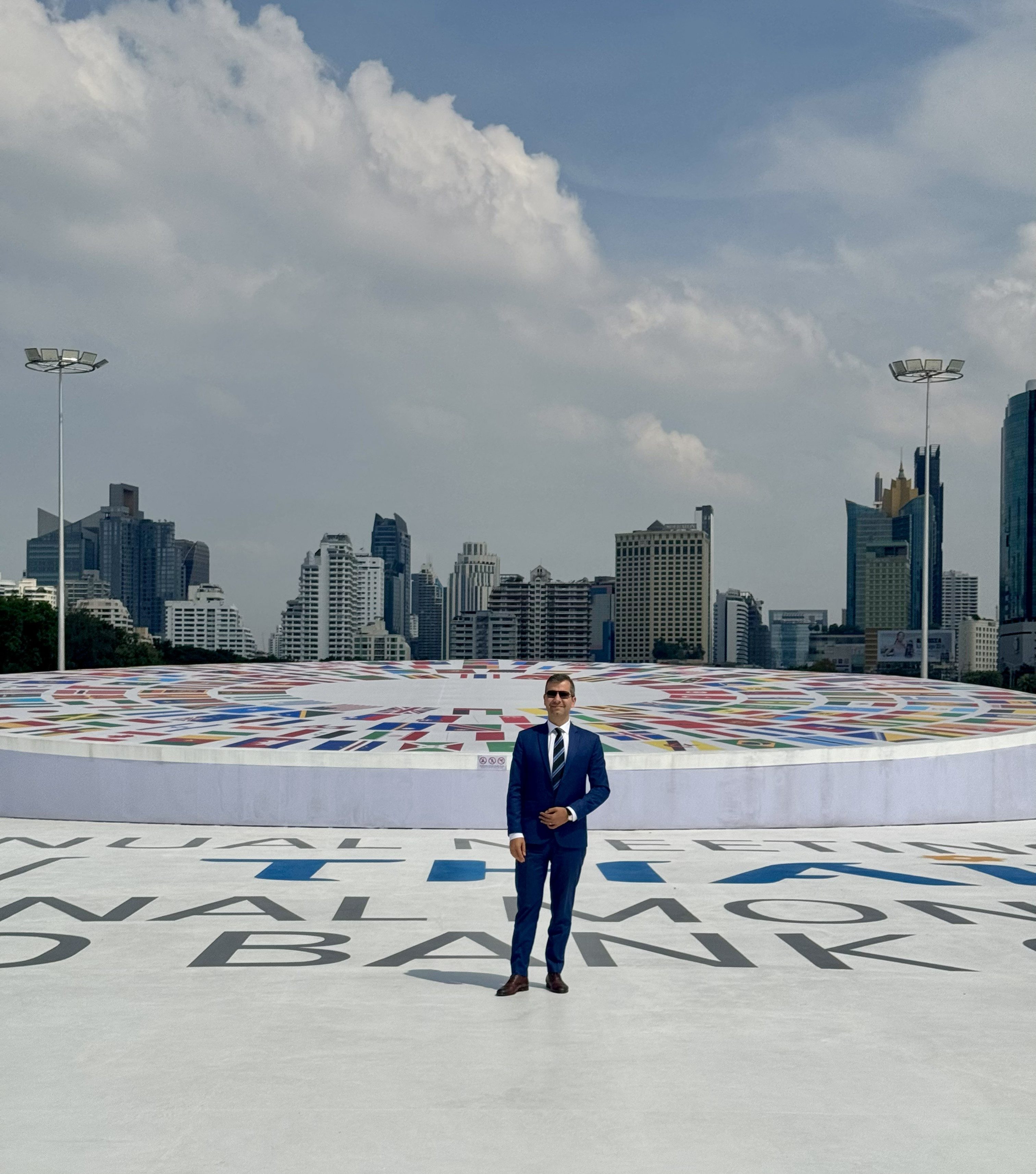 Sorin Pirau standing outside the convention center for the IMF meetings in Bangkok, October 2026.